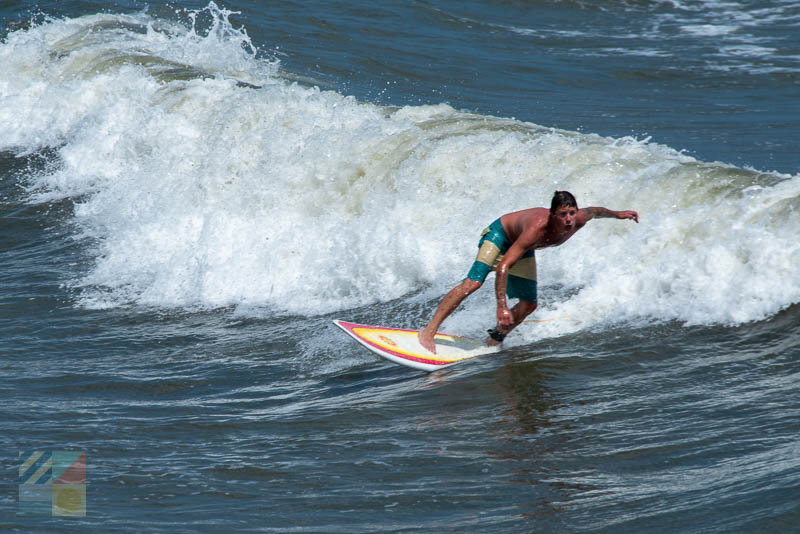 A surfer in Wrightsville Beach