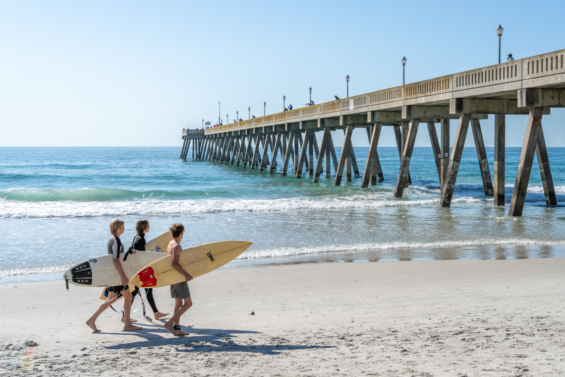Surfers on Wrightsville Beach