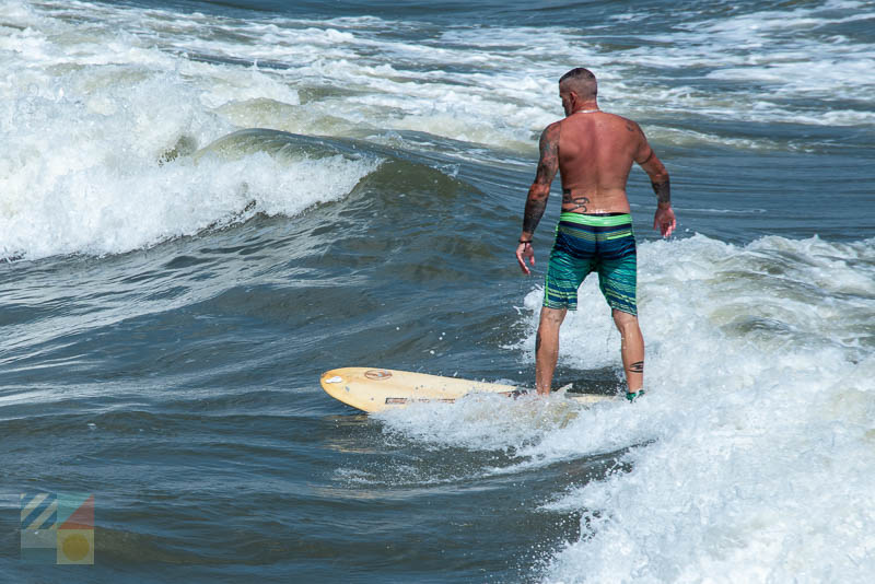 A surfer in Wrightsville Beach