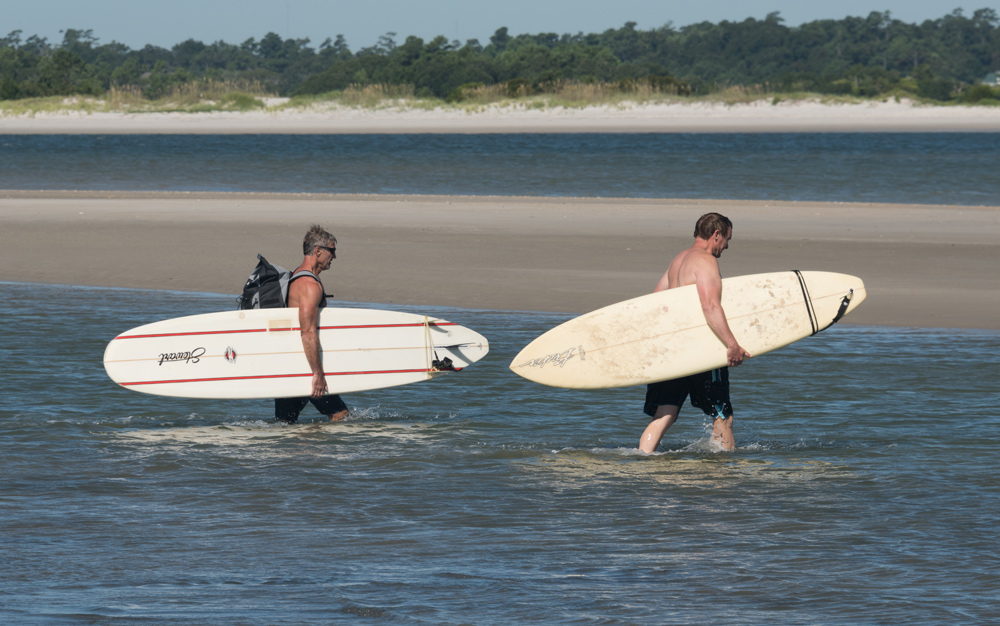 Surfers at Wrightsville Beach, NC