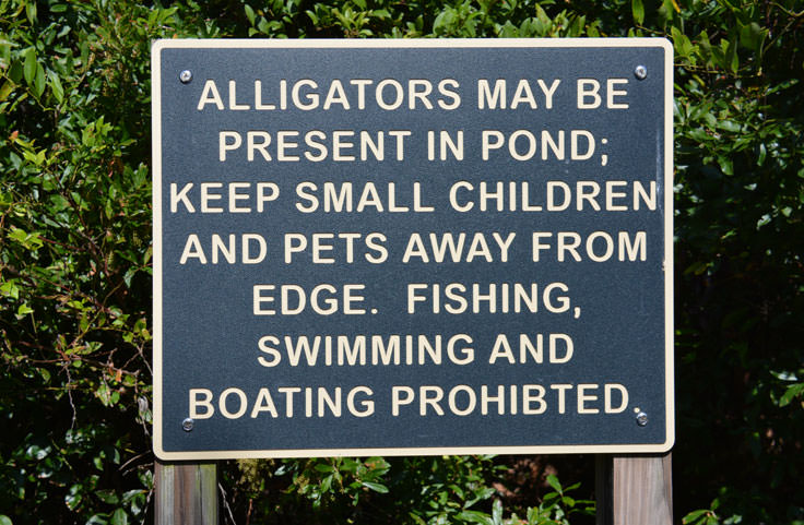 A warning sign at Halyburton Park in Wilmington, NC